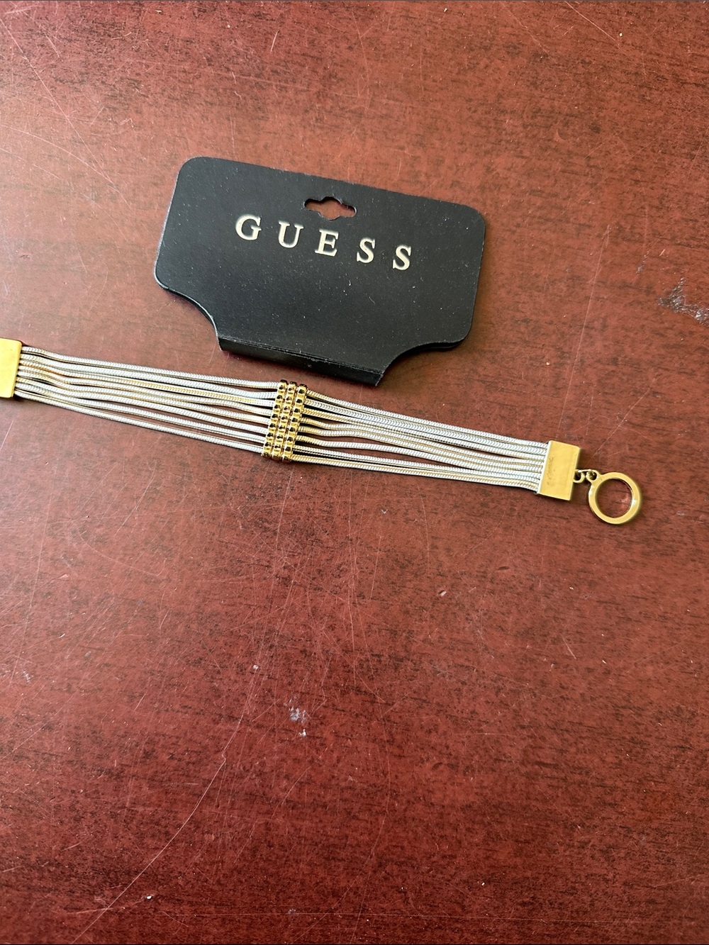 ##117, Guess by Marciano Two-Tone Multi-Strand Bracelet in Silver and Gold